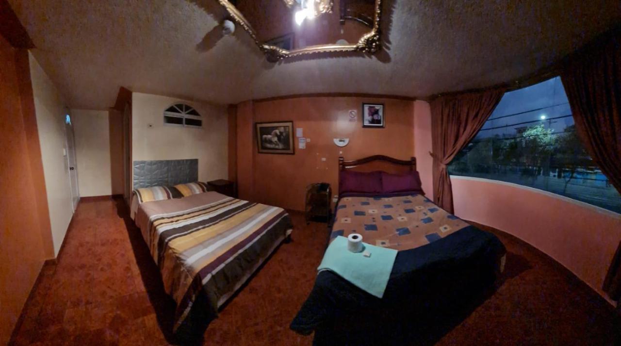 Отель Hostal Miguel Angel Кито Номер фото